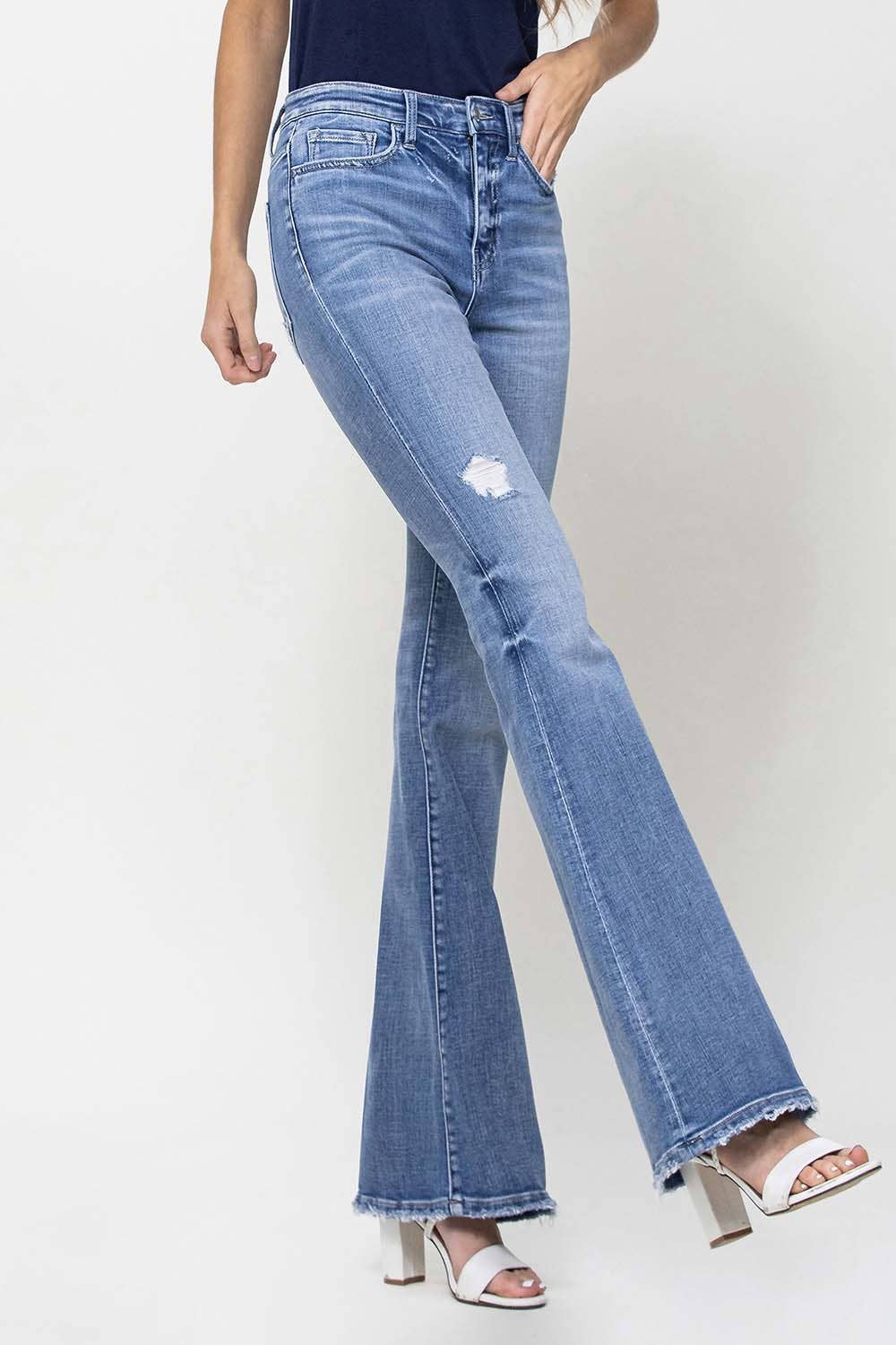 TRACY HIGH RISE DISTRESSED FLARE JEANS