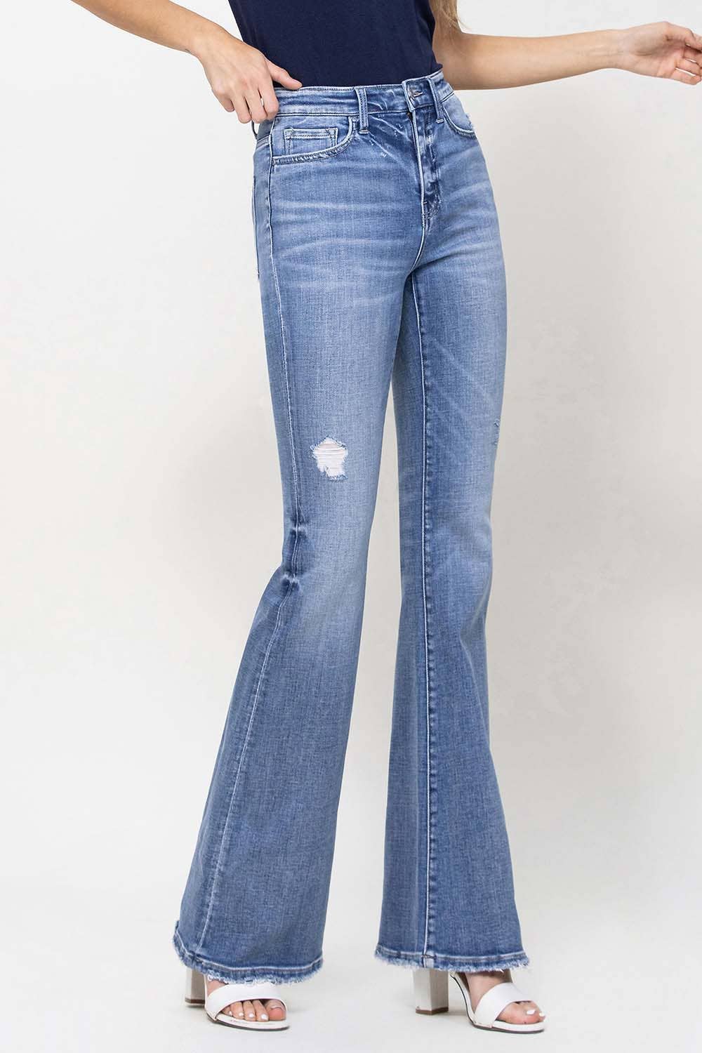 TRACY HIGH RISE DISTRESSED FLARE JEANS