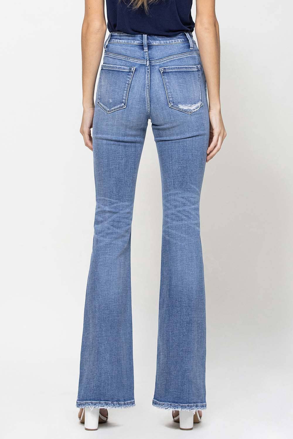 TRACY HIGH RISE DISTRESSED FLARE JEANS