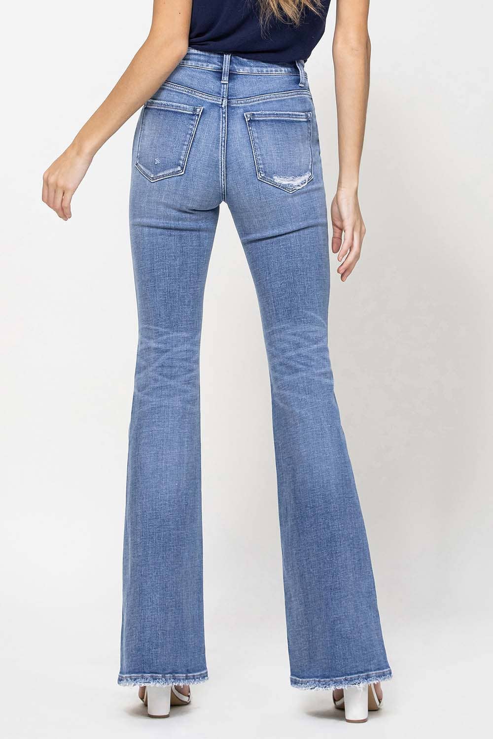 TRACY HIGH RISE DISTRESSED FLARE JEANS